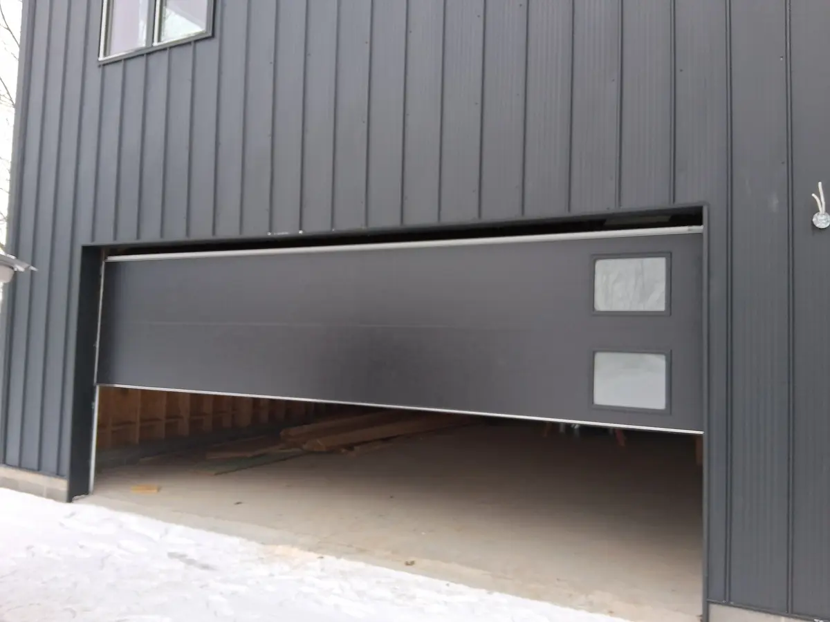 Custom overhead garage door finished installation and mechanical balance