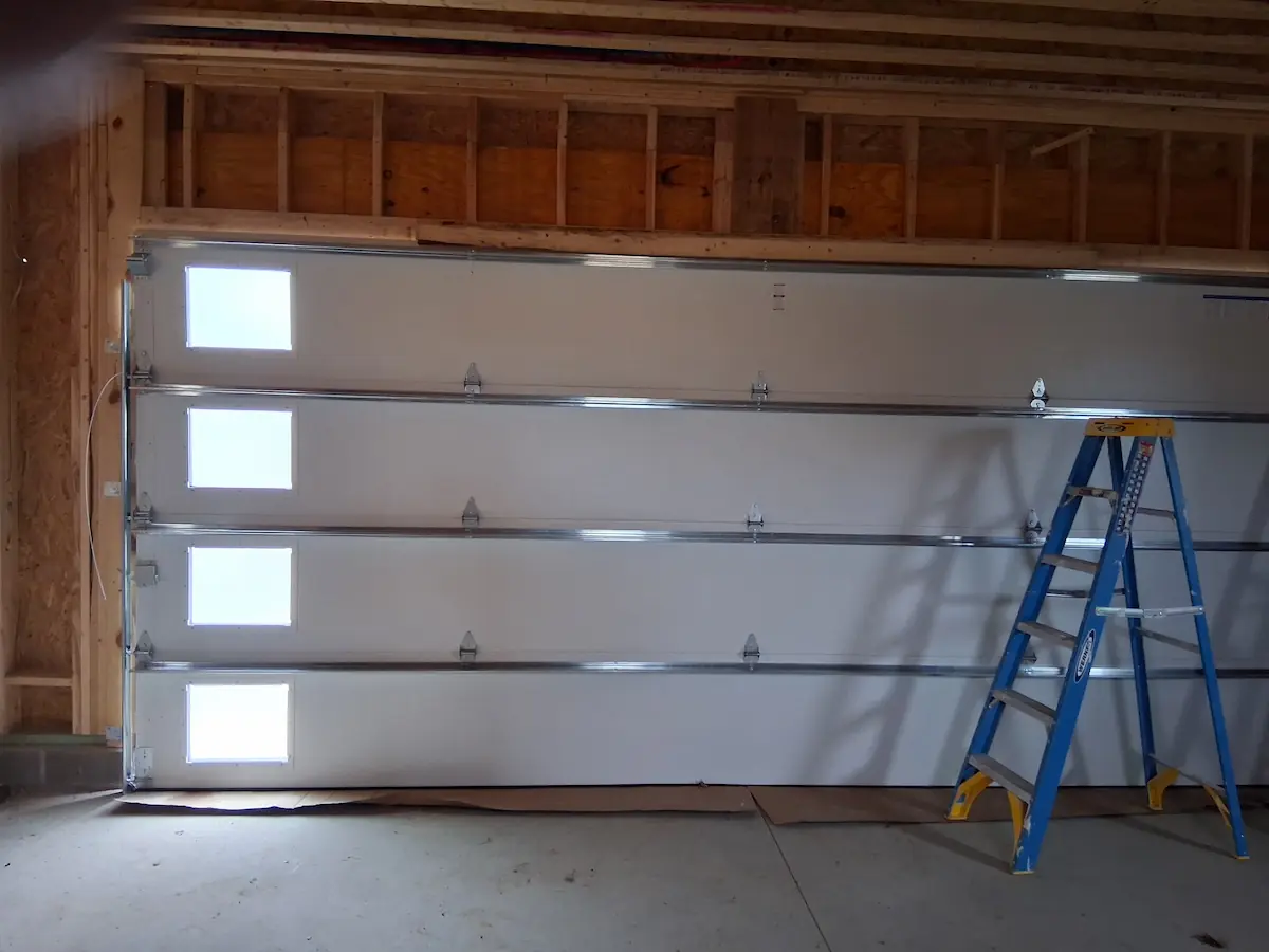 Custom overhead garage door interior high-torque torsion spring system